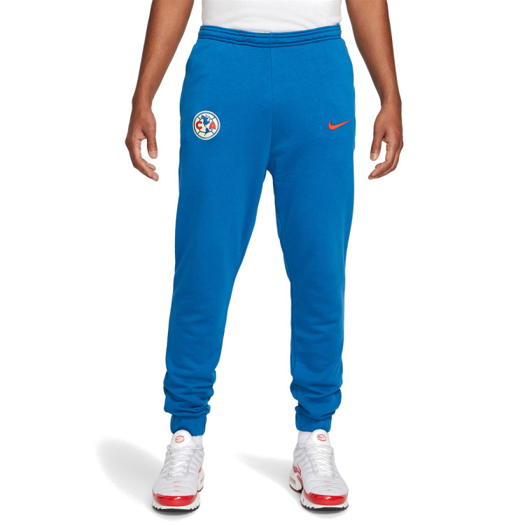 pantalon-largo-nike-club-america-fanswear-2023-2024-french-terry-blue-jay-habanero-red-0