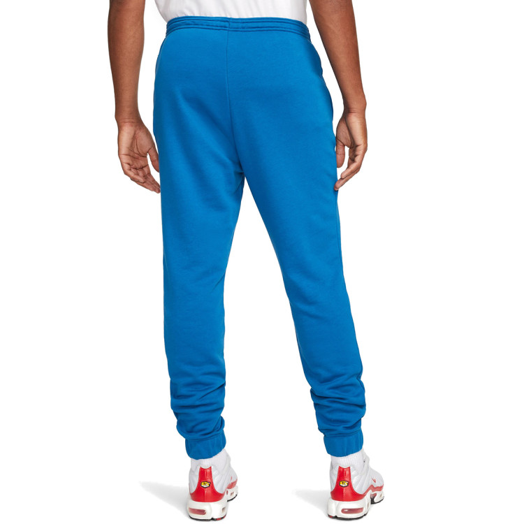 pantalon-largo-nike-club-america-fanswear-2023-2024-french-terry-blue-jay-habanero-red-1