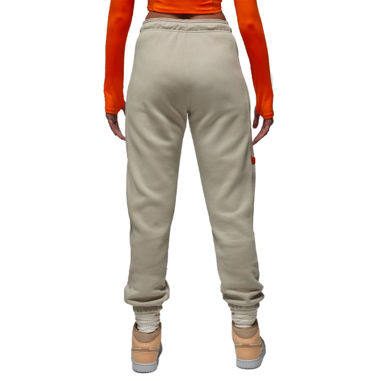 pantalon-largo-jordan-psg-fanswear-2023-2024-mujer-stone-magma-orange-1