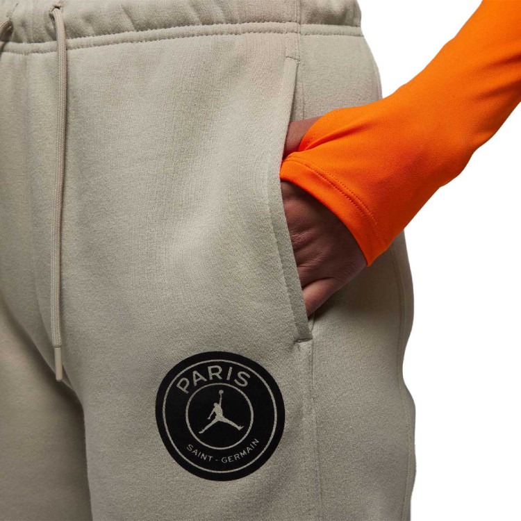 pantalon-largo-jordan-psg-fanswear-2023-2024-mujer-stone-magma-orange-2